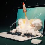 stock-photo-startup-concept-with-rocket-flying-out-of-laptop-screen-on-black-background-sideview-d-rendering-425939950